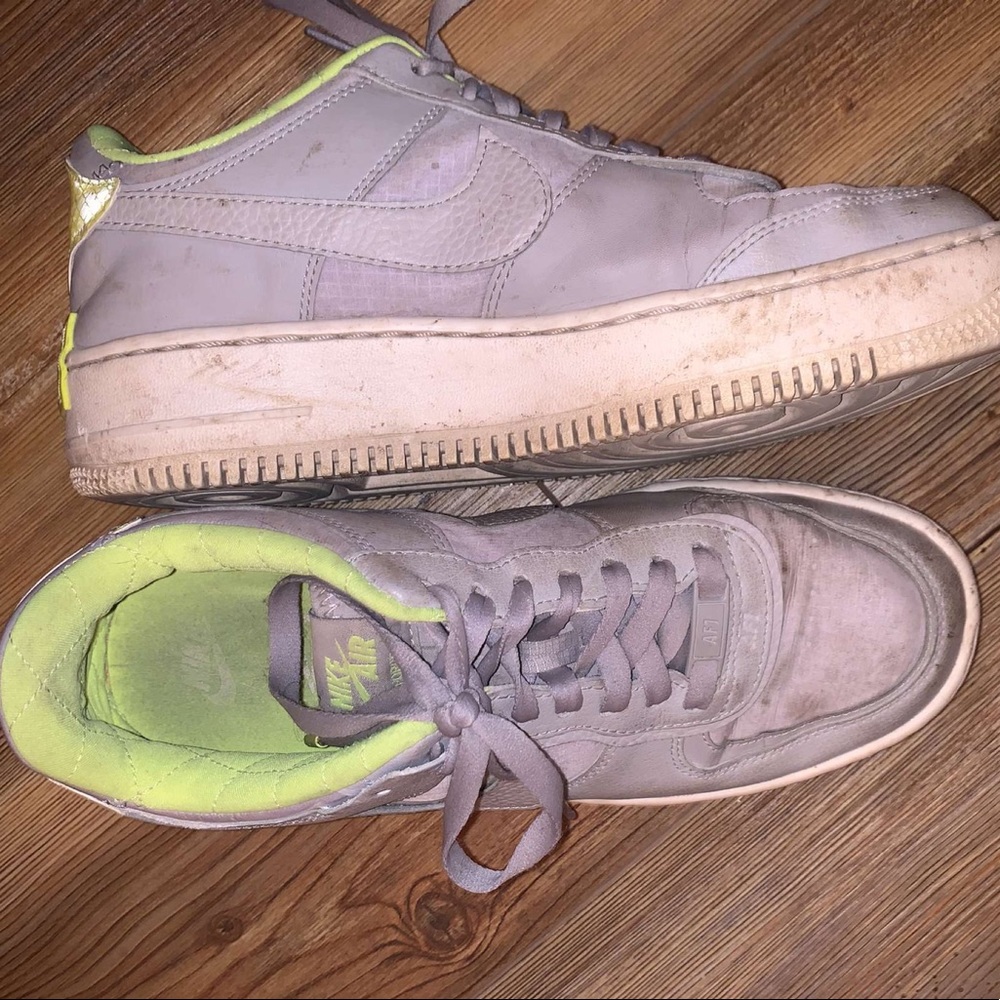 Fairly worn Nike Air Force ones.